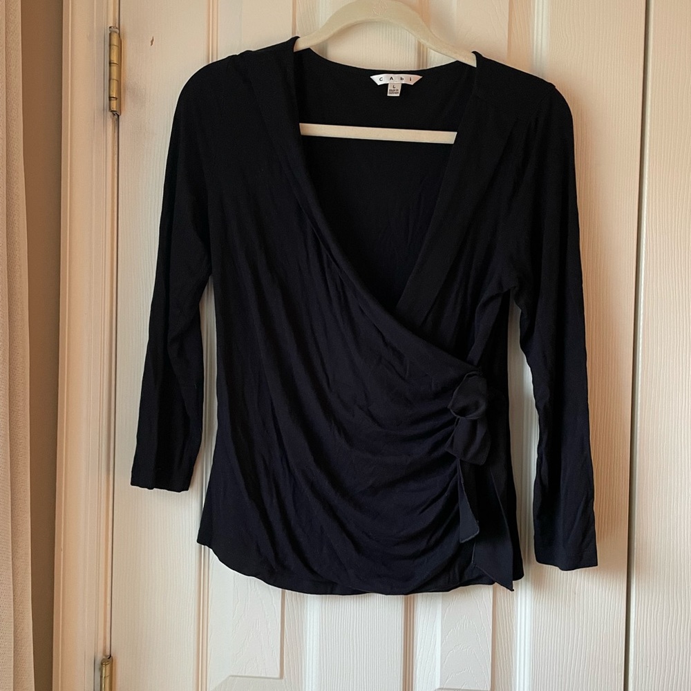 Cabi Wrap Top. Ballet style w/side buttons & detachable bow. Black. Size Large.